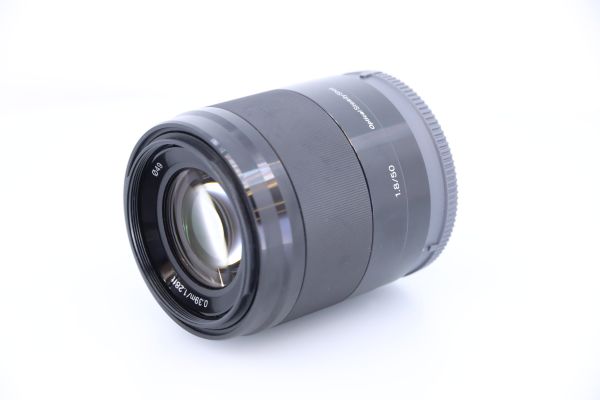 E 50mm f/1.8 OSS / gebraucht / Zustand B / gut / 1 Jahr Gewährleistung